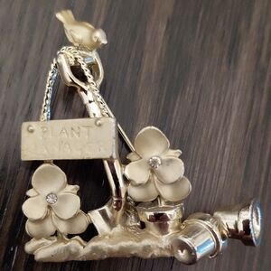 A J C Goldtone Floral Brooch with Bird Accent "Plant Manager"